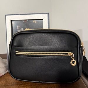 I black crossbody bag mint condition. NWT